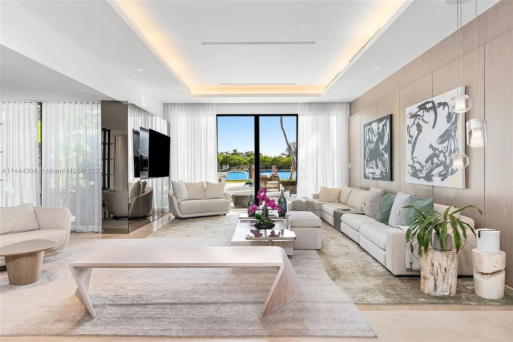 This 4 bedroom, 4 bathroom single-family home is located in the heart of Miami Beach and features an impeccable modern open-concept layout, high-end fixtures and finishes, and an incredible backyard with water features, lush landscaping, and 60 feet of waterfrontage.