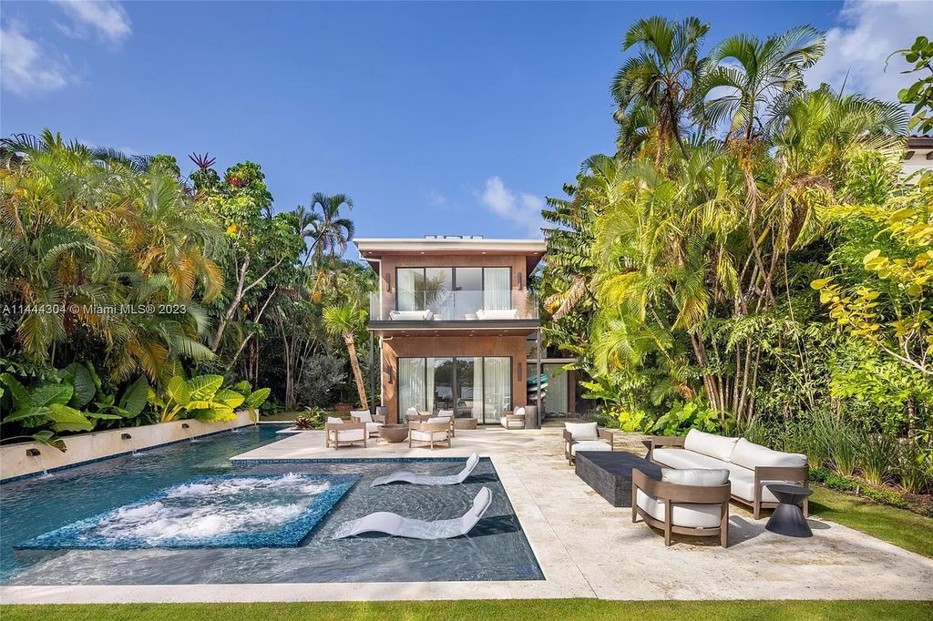 This 4 bedroom, 4 bathroom single-family home is located in the heart of Miami Beach and features an impeccable modern open-concept layout, high-end fixtures and finishes, and an incredible backyard with water features, lush landscaping, and 60 feet of waterfrontage.