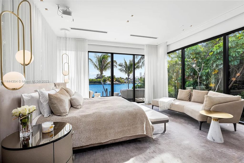 This 4 bedroom, 4 bathroom single-family home is located in the heart of Miami Beach and features an impeccable modern open-concept layout, high-end fixtures and finishes, and an incredible backyard with water features, lush landscaping, and 60 feet of waterfrontage.