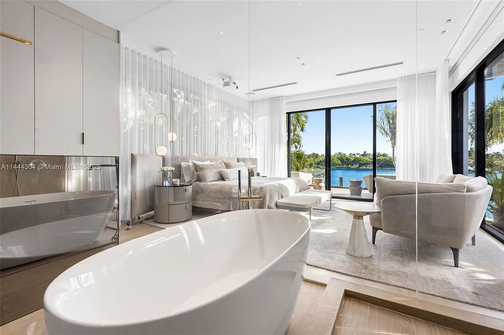 This 4 bedroom, 4 bathroom single-family home is located in the heart of Miami Beach and features an impeccable modern open-concept layout, high-end fixtures and finishes, and an incredible backyard with water features, lush landscaping, and 60 feet of waterfrontage.