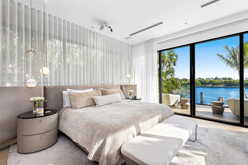 This 4 bedroom, 4 bathroom single-family home is located in the heart of Miami Beach and features an impeccable modern open-concept layout, high-end fixtures and finishes, and an incredible backyard with water features, lush landscaping, and 60 feet of waterfrontage.