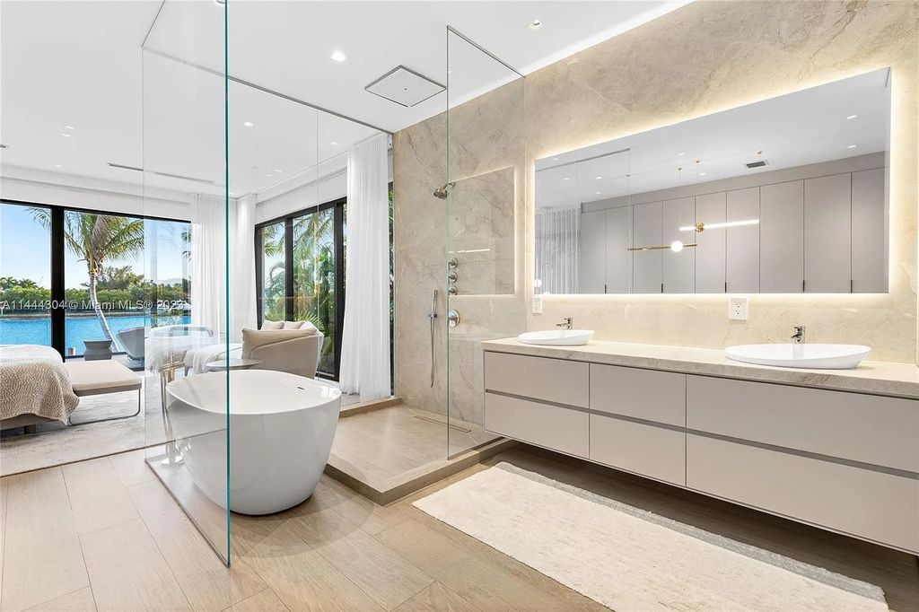 This 4 bedroom, 4 bathroom single-family home is located in the heart of Miami Beach and features an impeccable modern open-concept layout, high-end fixtures and finishes, and an incredible backyard with water features, lush landscaping, and 60 feet of waterfrontage.