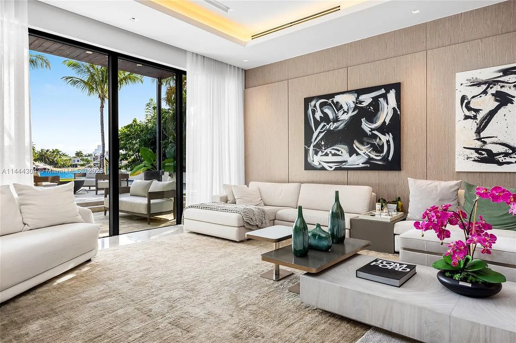 This 4 bedroom, 4 bathroom single-family home is located in the heart of Miami Beach and features an impeccable modern open-concept layout, high-end fixtures and finishes, and an incredible backyard with water features, lush landscaping, and 60 feet of waterfrontage.