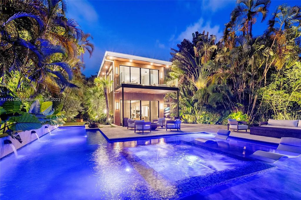 This 4 bedroom, 4 bathroom single-family home is located in the heart of Miami Beach and features an impeccable modern open-concept layout, high-end fixtures and finishes, and an incredible backyard with water features, lush landscaping, and 60 feet of waterfrontage.