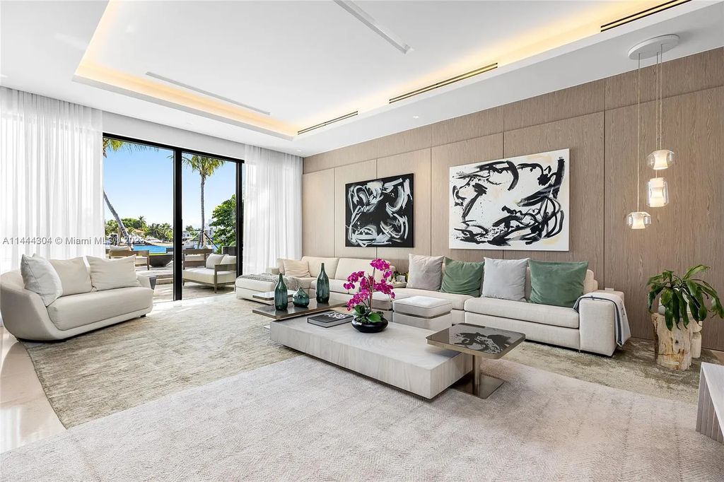 This 4 bedroom, 4 bathroom single-family home is located in the heart of Miami Beach and features an impeccable modern open-concept layout, high-end fixtures and finishes, and an incredible backyard with water features, lush landscaping, and 60 feet of waterfrontage.