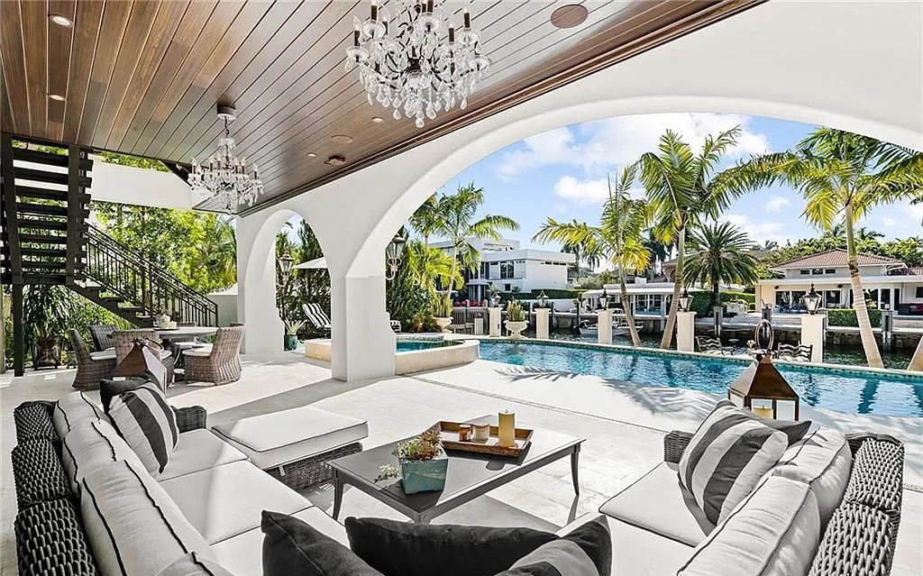 This stunning 5 bedroom / 7.5 bath luxury villa in Fort Lauderdale, FL offers the ultimate in waterfront living. With breathtaking views of the canal, a private dock, and a resort-style pool, this home is perfect for entertaining guests or simply relaxing and enjoying the Florida lifestyle.