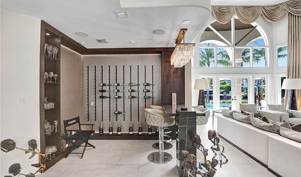 This fully renovated waterfront estate in Harbor Beach, Fort Lauderdale offers the best of both worlds: modern elegance and traditional charm. With over 8,000 square feet of living space, soaring ceilings, and an open floor plan, this home is perfect for entertaining.