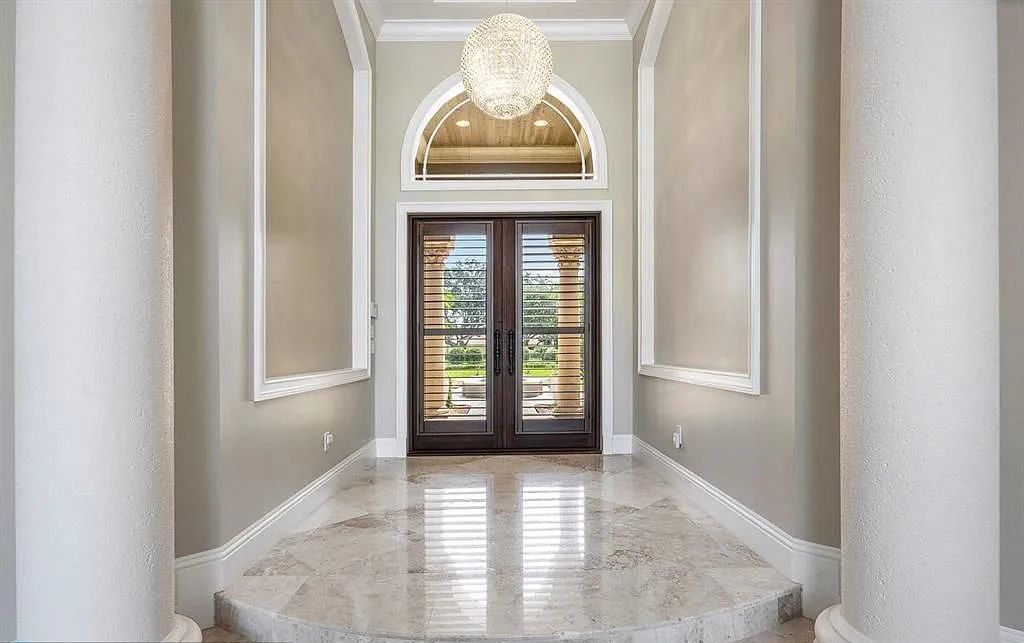 Gold Standard in Luxury & Privacy! Exceptional finishes, the finest craftsmanship, meticulous millwork & soaring vaulted groin coffered ceilings perfectly blend to create a sophisticated & special estate. Walls of impact glass welcome in soft natural light, views of the glorious pool & beautiful outdoor spaces throughout.