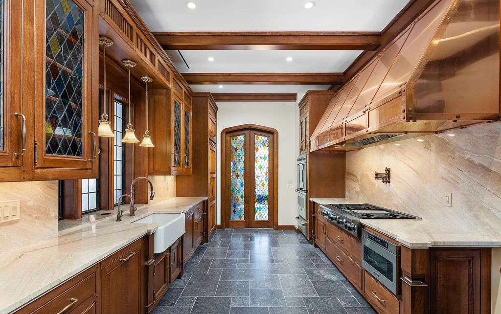 Transport your friends and family to the Roaring Twenties in this exquisite Tudor Revival estate, listed on the National Historic Register and featured in six movies.