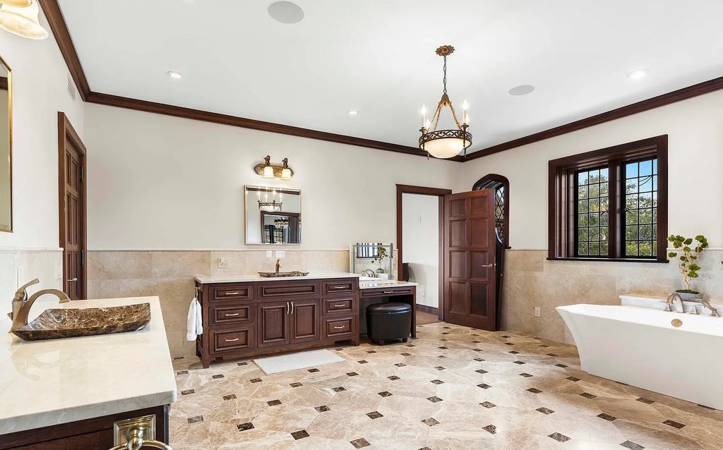 Transport your friends and family to the Roaring Twenties in this exquisite Tudor Revival estate, listed on the National Historic Register and featured in six movies.