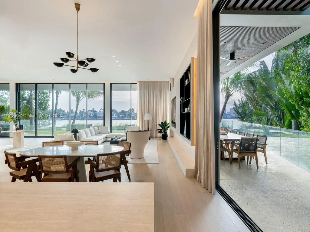 Experience the ultimate in island living at 28 West Dilido in Miami Beach. This stunning waterfront home offers stunning Downtown Skyline views, effortlessly chic interiors, and luxurious amenities, including a private dock and cinema screen.