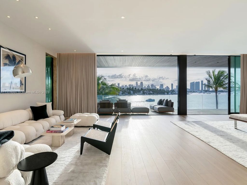 Experience the ultimate in island living at 28 West Dilido in Miami Beach. This stunning waterfront home offers stunning Downtown Skyline views, effortlessly chic interiors, and luxurious amenities, including a private dock and cinema screen.