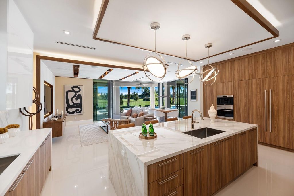 Recently completed brand new custom construction home with stunning golf course views in the most private & quiet section of The Enclave. This home features 2 primary suites, a chef's kitchen, and an expansive outdoor summer kitchen. Perfect for entertaining!