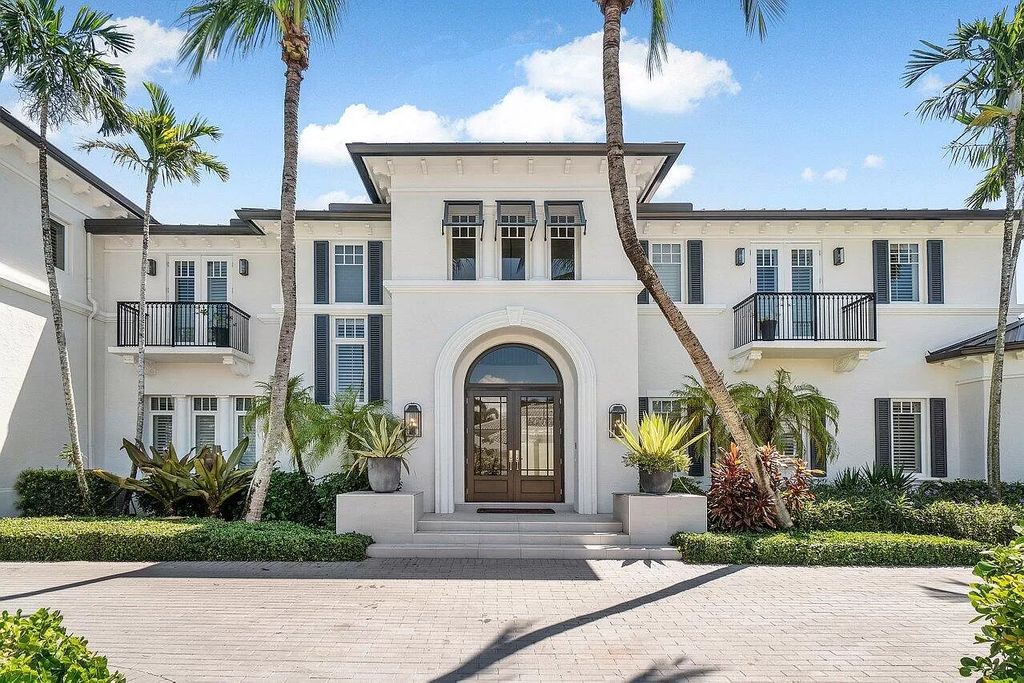 This spectacular waterfront masterpiece in Boca Bay Colony features 6 bedrooms, 8 baths, 7,282 sq ft, 265 ft of water frontage, and a deepwater dock that can accommodate a mega yacht. The chef-designed kitchen, home theater, 400-bottle wine cellar, and expansive backyard with pool, summer kitchen, and pergola offer endless possibilities for relaxation and entertainment. Schedule your private showing today!