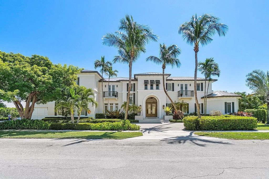 This spectacular waterfront masterpiece in Boca Bay Colony features 6 bedrooms, 8 baths, 7,282 sq ft, 265 ft of water frontage, and a deepwater dock that can accommodate a mega yacht. The chef-designed kitchen, home theater, 400-bottle wine cellar, and expansive backyard with pool, summer kitchen, and pergola offer endless possibilities for relaxation and entertainment. Schedule your private showing today!