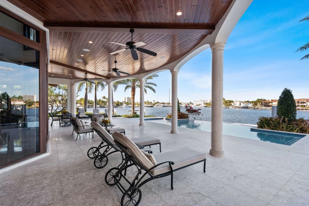 This luxurious estate in the exclusive Sunrise Key neighborhood of Fort Lauderdale offers stunning river views, a coveted point lot location, and high-end finishes throughout. The main house features marble floors, soaring ceilings, floor-to-ceiling windows, and an open floor plan perfect for entertaining.