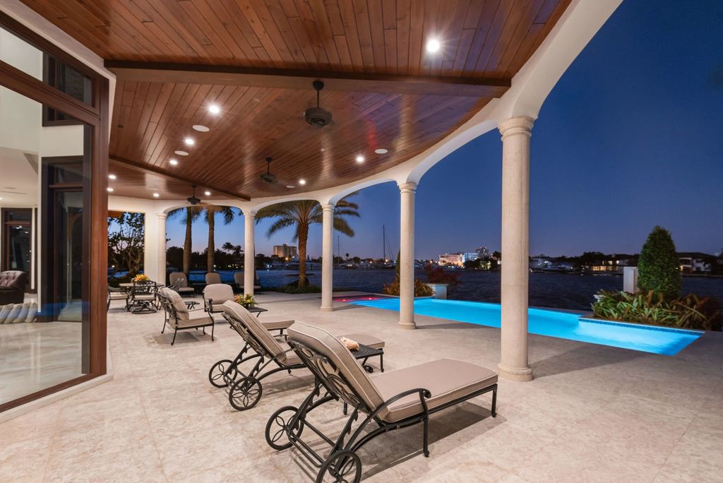 This luxurious estate in the exclusive Sunrise Key neighborhood of Fort Lauderdale offers stunning river views, a coveted point lot location, and high-end finishes throughout. The main house features marble floors, soaring ceilings, floor-to-ceiling windows, and an open floor plan perfect for entertaining.