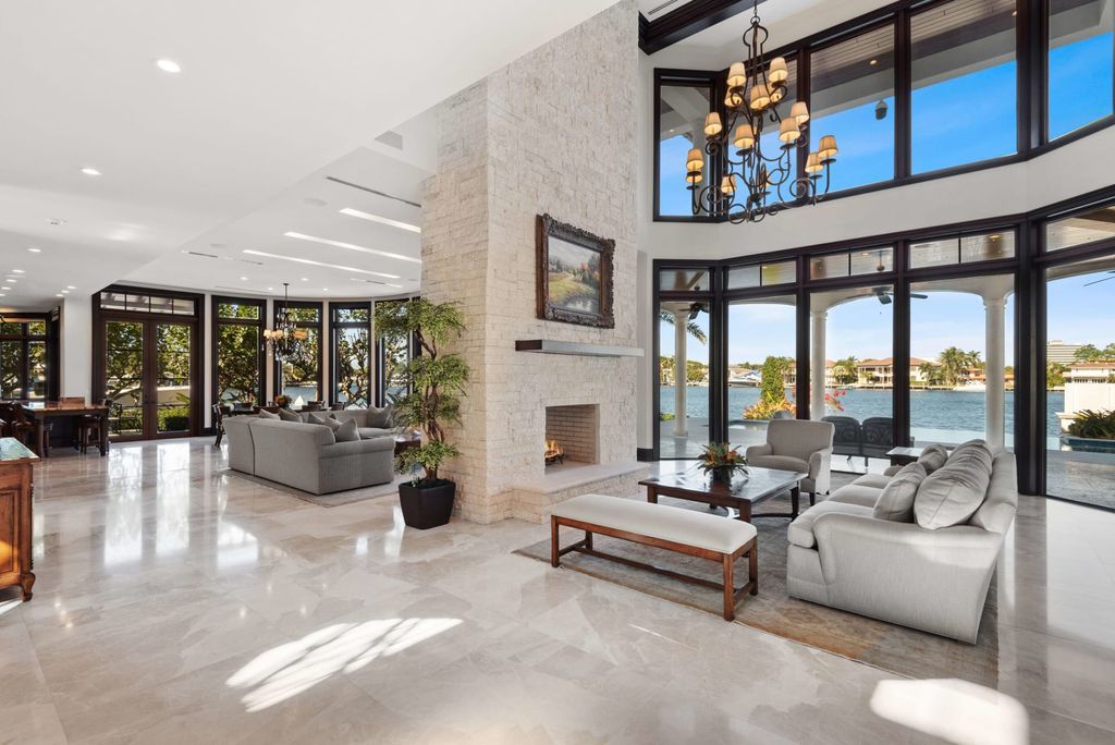 This luxurious estate in the exclusive Sunrise Key neighborhood of Fort Lauderdale offers stunning river views, a coveted point lot location, and high-end finishes throughout. The main house features marble floors, soaring ceilings, floor-to-ceiling windows, and an open floor plan perfect for entertaining.