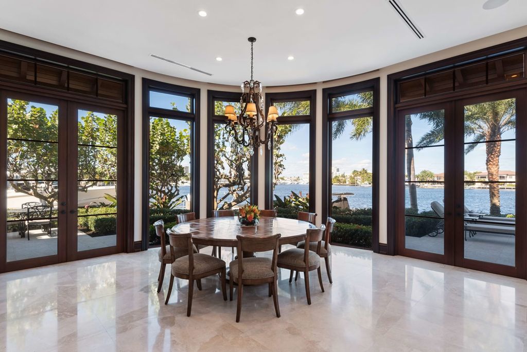 This luxurious estate in the exclusive Sunrise Key neighborhood of Fort Lauderdale offers stunning river views, a coveted point lot location, and high-end finishes throughout. The main house features marble floors, soaring ceilings, floor-to-ceiling windows, and an open floor plan perfect for entertaining.