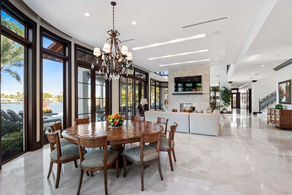 This luxurious estate in the exclusive Sunrise Key neighborhood of Fort Lauderdale offers stunning river views, a coveted point lot location, and high-end finishes throughout. The main house features marble floors, soaring ceilings, floor-to-ceiling windows, and an open floor plan perfect for entertaining.