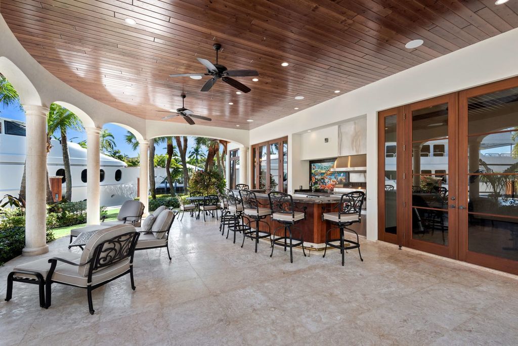 This luxurious estate in the exclusive Sunrise Key neighborhood of Fort Lauderdale offers stunning river views, a coveted point lot location, and high-end finishes throughout. The main house features marble floors, soaring ceilings, floor-to-ceiling windows, and an open floor plan perfect for entertaining.