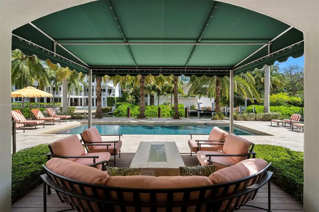 This stunning 17,873 total SF waterfront estate in The Moorings community of Coconut Grove features 7 bedrooms, 9+2 bathrooms, multiple covered terraces, a gourmet eat-in kitchen, an elegant primary suite, a pool, dock, house generator, and direct access to Biscayne Bay. Enjoy endless water views and close proximity to the finest dining, shopping, and schools.