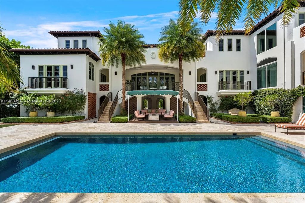 This stunning 17,873 total SF waterfront estate in The Moorings community of Coconut Grove features 7 bedrooms, 9+2 bathrooms, multiple covered terraces, a gourmet eat-in kitchen, an elegant primary suite, a pool, dock, house generator, and direct access to Biscayne Bay. Enjoy endless water views and close proximity to the finest dining, shopping, and schools.