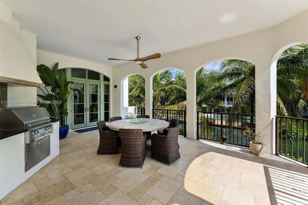 This stunning 17,873 total SF waterfront estate in The Moorings community of Coconut Grove features 7 bedrooms, 9+2 bathrooms, multiple covered terraces, a gourmet eat-in kitchen, an elegant primary suite, a pool, dock, house generator, and direct access to Biscayne Bay. Enjoy endless water views and close proximity to the finest dining, shopping, and schools.