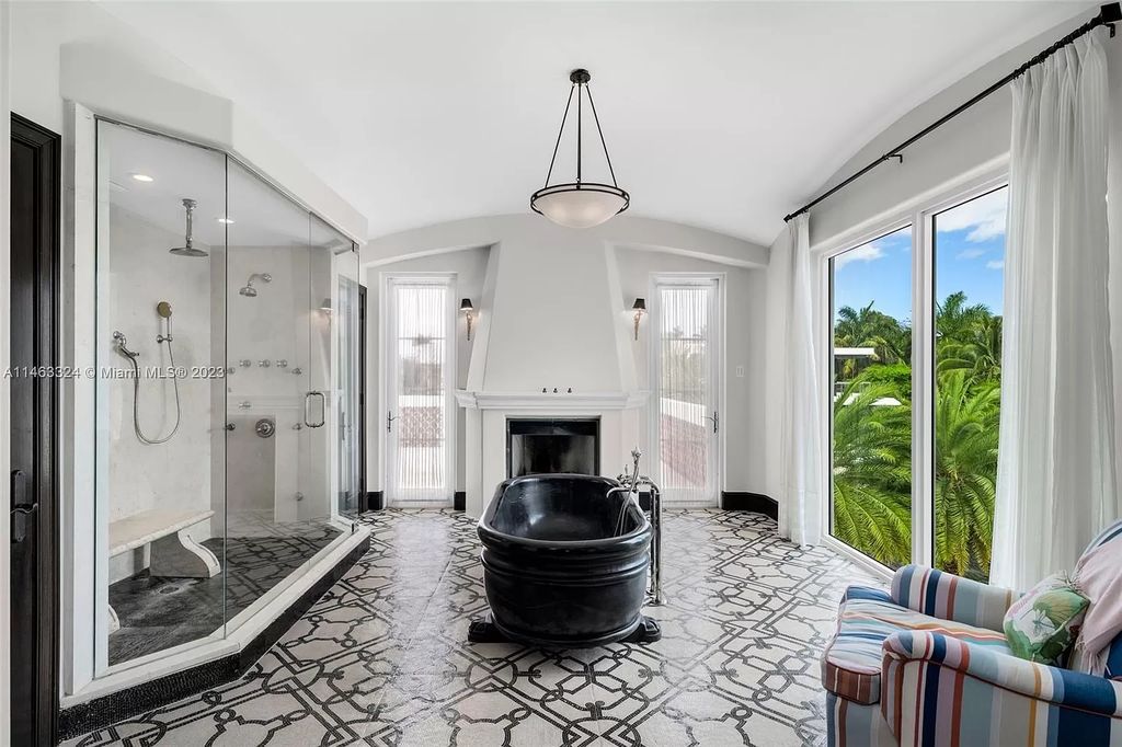 This stunning 17,873 total SF waterfront estate in The Moorings community of Coconut Grove features 7 bedrooms, 9+2 bathrooms, multiple covered terraces, a gourmet eat-in kitchen, an elegant primary suite, a pool, dock, house generator, and direct access to Biscayne Bay. Enjoy endless water views and close proximity to the finest dining, shopping, and schools.