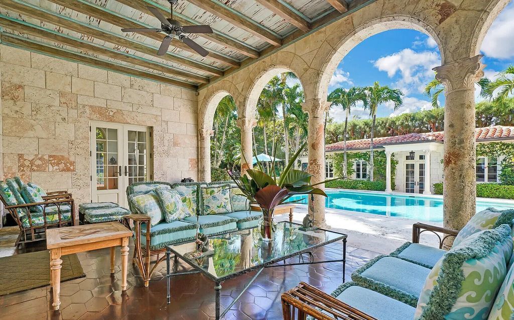 This beautifully renovated coral estate on Palm Beach is one of the island's greatest landmark residences. With four family bedrooms in the main house and one bedroom with living room in the separate pool/guesthouse, stunning ocean views, an underground wine cellar, and deeded beach rights, this property has everything you could ever want in a luxury home.