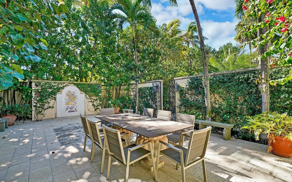 This beautifully renovated coral estate on Palm Beach is one of the island's greatest landmark residences. With four family bedrooms in the main house and one bedroom with living room in the separate pool/guesthouse, stunning ocean views, an underground wine cellar, and deeded beach rights, this property has everything you could ever want in a luxury home.