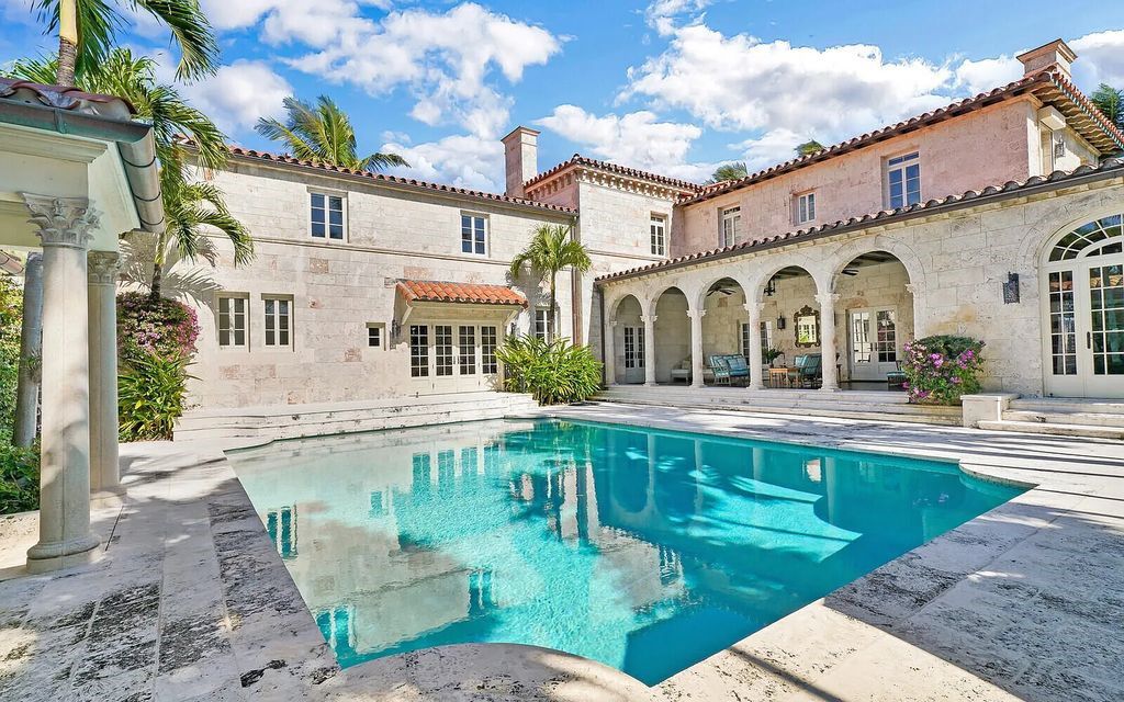 This beautifully renovated coral estate on Palm Beach is one of the island's greatest landmark residences. With four family bedrooms in the main house and one bedroom with living room in the separate pool/guesthouse, stunning ocean views, an underground wine cellar, and deeded beach rights, this property has everything you could ever want in a luxury home.