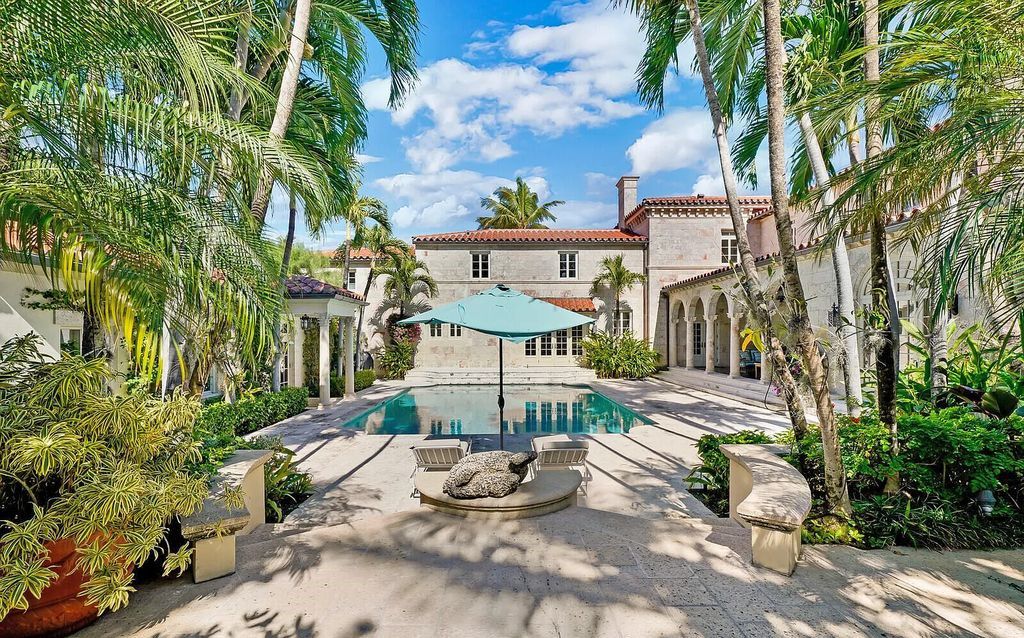 This beautifully renovated coral estate on Palm Beach is one of the island's greatest landmark residences. With four family bedrooms in the main house and one bedroom with living room in the separate pool/guesthouse, stunning ocean views, an underground wine cellar, and deeded beach rights, this property has everything you could ever want in a luxury home.