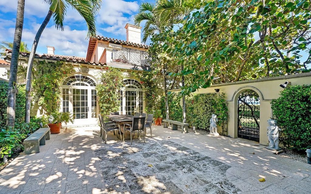 This beautifully renovated coral estate on Palm Beach is one of the island's greatest landmark residences. With four family bedrooms in the main house and one bedroom with living room in the separate pool/guesthouse, stunning ocean views, an underground wine cellar, and deeded beach rights, this property has everything you could ever want in a luxury home.