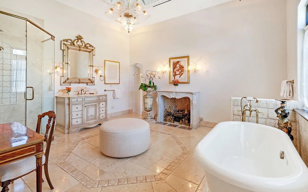 This beautifully renovated coral estate on Palm Beach is one of the island's greatest landmark residences. With four family bedrooms in the main house and one bedroom with living room in the separate pool/guesthouse, stunning ocean views, an underground wine cellar, and deeded beach rights, this property has everything you could ever want in a luxury home.