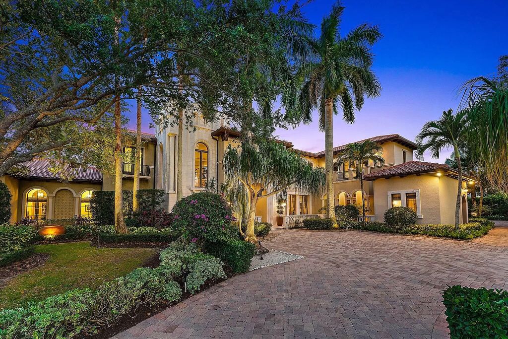 This stunning 5 bedroom, 7.5 bathroom Mediterranean villa is nestled on a private 3/4 acre lot in the prestigious Old Palm Golf Club community. With over 9,200 square feet of living space, this home boasts exceptional features such as a grand two story entry, high ceilings throughout, a spacious primary suite with dual luxury baths and sitting room, a game room, bar, wine room, chef's kitchen, and extended outdoor living space. Enjoy panoramic golf course views from the balconies or relax on the spacious paver patios with fountains. This home leaves nothing to be desired!