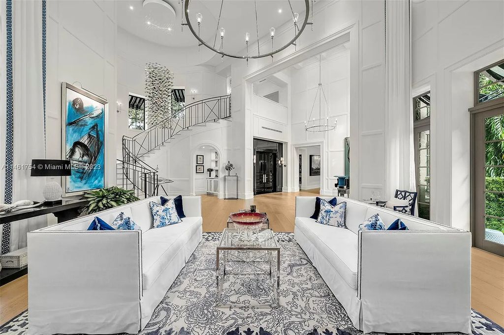 A $16 million masterpiece in Ponce Davis, Miami. This meticulously renovated residence offers the finest in luxury and refinement, from its grand foyer to its lavish master suite. Outdoors, al-fresco moments flourish with covered terraces, a pool/spa, and a summer kitchen.