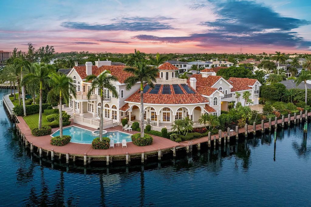 Villa Bellevue, a stunning European-inspired waterfront estate in Boca Raton, FL, offers timeless sophistication and refined beauty. This expansive 2.5-lot estate features 8 lavishly appointed bedrooms, 8.2 impeccably designed bathrooms, and a state-of-the-art kitchen. Enjoy breathtaking views of Spanish River Park and the Intracoastal Waterway from the outdoor setting, complete with a gas-operated summer kitchen, sparkling pool, and inviting spa. Villa Bellevue is a true sanctuary of grace and refinement.