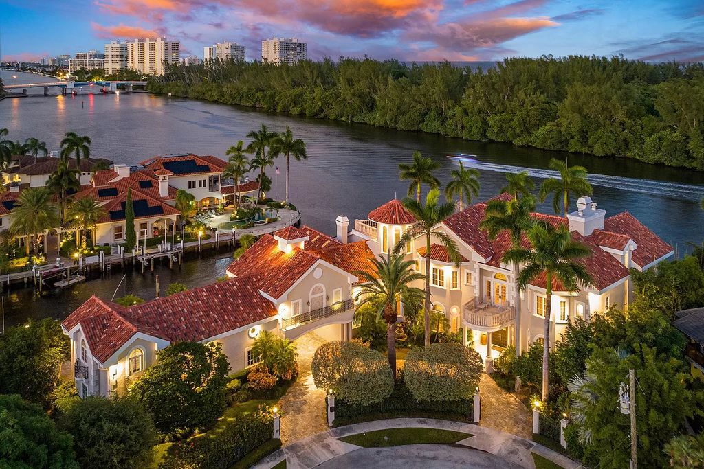 Villa Bellevue, a stunning European-inspired waterfront estate in Boca Raton, FL, offers timeless sophistication and refined beauty. This expansive 2.5-lot estate features 8 lavishly appointed bedrooms, 8.2 impeccably designed bathrooms, and a state-of-the-art kitchen. Enjoy breathtaking views of Spanish River Park and the Intracoastal Waterway from the outdoor setting, complete with a gas-operated summer kitchen, sparkling pool, and inviting spa. Villa Bellevue is a true sanctuary of grace and refinement.