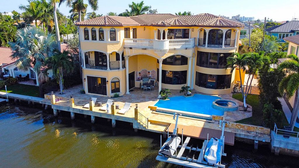 Experience the epitome of luxury living in this palatial waterfront estate in Delray Beach Shores. With 9,674 sq ft, 6-7 bedrooms, 7.2 baths, elevator, state-of-the-art theater, and more, this residence offers the perfect blend of tranquility and convenience. Immerse yourself in the dream of luxury waterfront living with breathtaking custom finishings, awe-inspiring views, and a heated infinity pool.