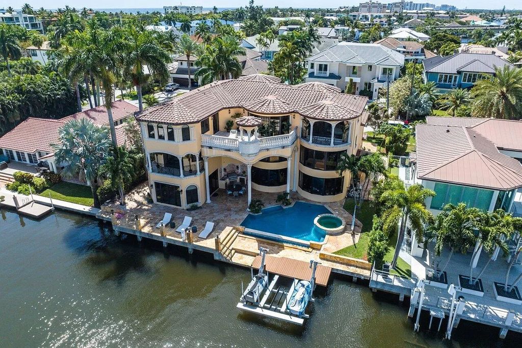 Experience the epitome of luxury living in this palatial waterfront estate in Delray Beach Shores. With 9,674 sq ft, 6-7 bedrooms, 7.2 baths, elevator, state-of-the-art theater, and more, this residence offers the perfect blend of tranquility and convenience. Immerse yourself in the dream of luxury waterfront living with breathtaking custom finishings, awe-inspiring views, and a heated infinity pool.