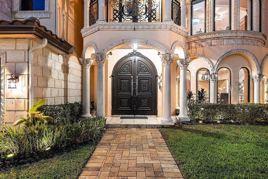 Experience the epitome of luxury living in this palatial waterfront estate in Delray Beach Shores. With 9,674 sq ft, 6-7 bedrooms, 7.2 baths, elevator, state-of-the-art theater, and more, this residence offers the perfect blend of tranquility and convenience. Immerse yourself in the dream of luxury waterfront living with breathtaking custom finishings, awe-inspiring views, and a heated infinity pool.