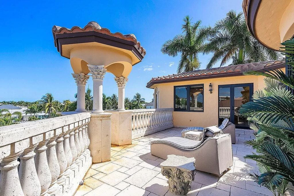 Experience the epitome of luxury living in this palatial waterfront estate in Delray Beach Shores. With 9,674 sq ft, 6-7 bedrooms, 7.2 baths, elevator, state-of-the-art theater, and more, this residence offers the perfect blend of tranquility and convenience. Immerse yourself in the dream of luxury waterfront living with breathtaking custom finishings, awe-inspiring views, and a heated infinity pool.