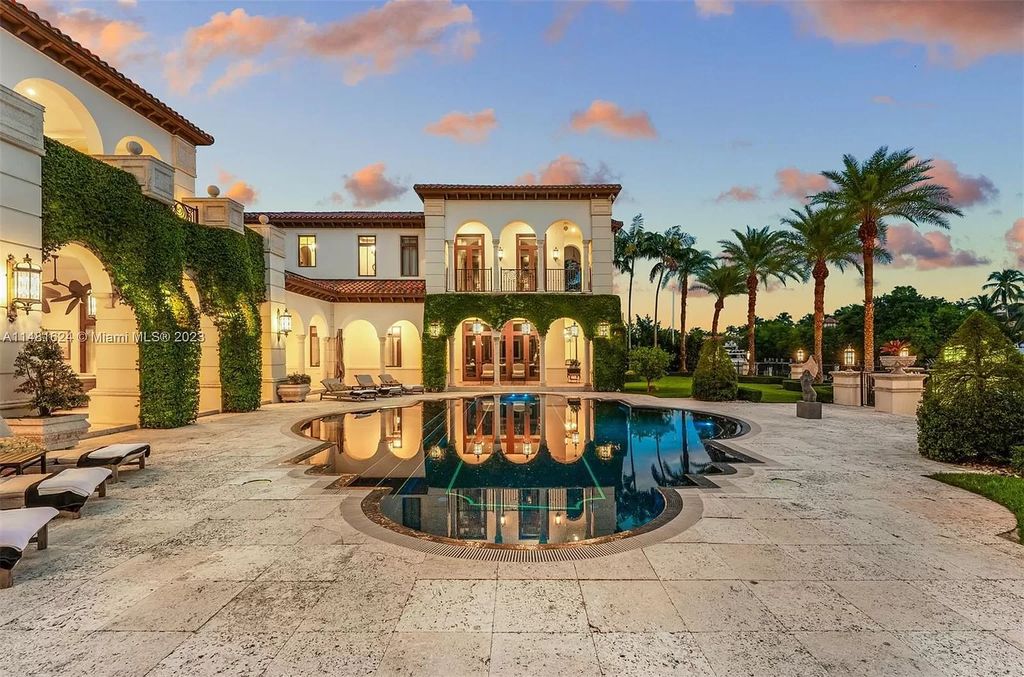 Immerse yourself in luxury and exclusivity at this captivating Mediterranean-style estate, nestled on the coveted Edgewater Drive in Coral Gables, FL. Boasting 180 feet of deep-water frontage, a rare 80-foot inlet slip, and direct bay access, this waterfront oasis offers unparalleled tranquility and recreational opportunities.