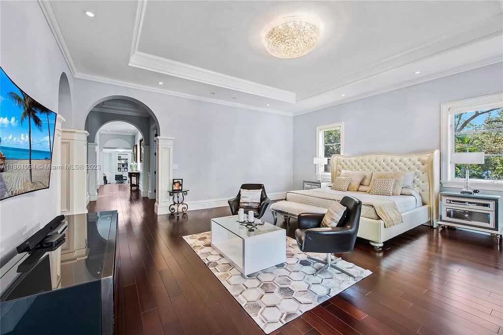 This stunning palatial Neoclassical estate in Coral Gables is the perfect entertainer's dream, with an enormous entertainment wing, movie theater, private guest suite, and resort-style amenities. The 4000sf master wing features a gym, dual closets, luxurious bathroom, large sitting room/office, and expansive terraces. Also includes separate staff/in-law quarters, oversized garages for 6 cars, and access to a 40ft boat slip in Snapper Creek Marina.