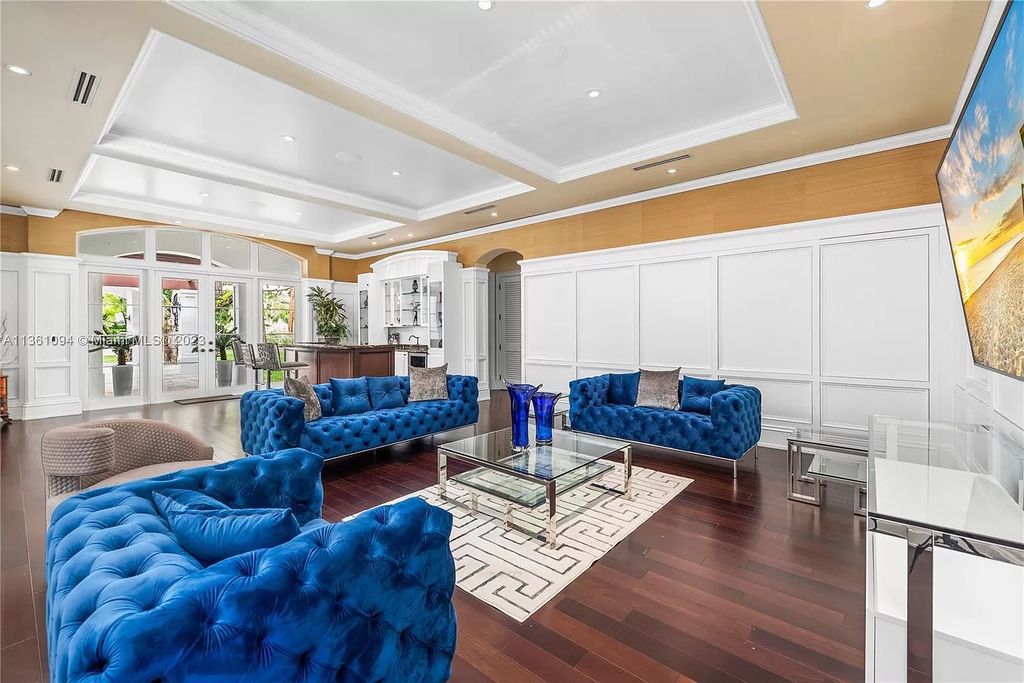 This stunning palatial Neoclassical estate in Coral Gables is the perfect entertainer's dream, with an enormous entertainment wing, movie theater, private guest suite, and resort-style amenities. The 4000sf master wing features a gym, dual closets, luxurious bathroom, large sitting room/office, and expansive terraces. Also includes separate staff/in-law quarters, oversized garages for 6 cars, and access to a 40ft boat slip in Snapper Creek Marina.