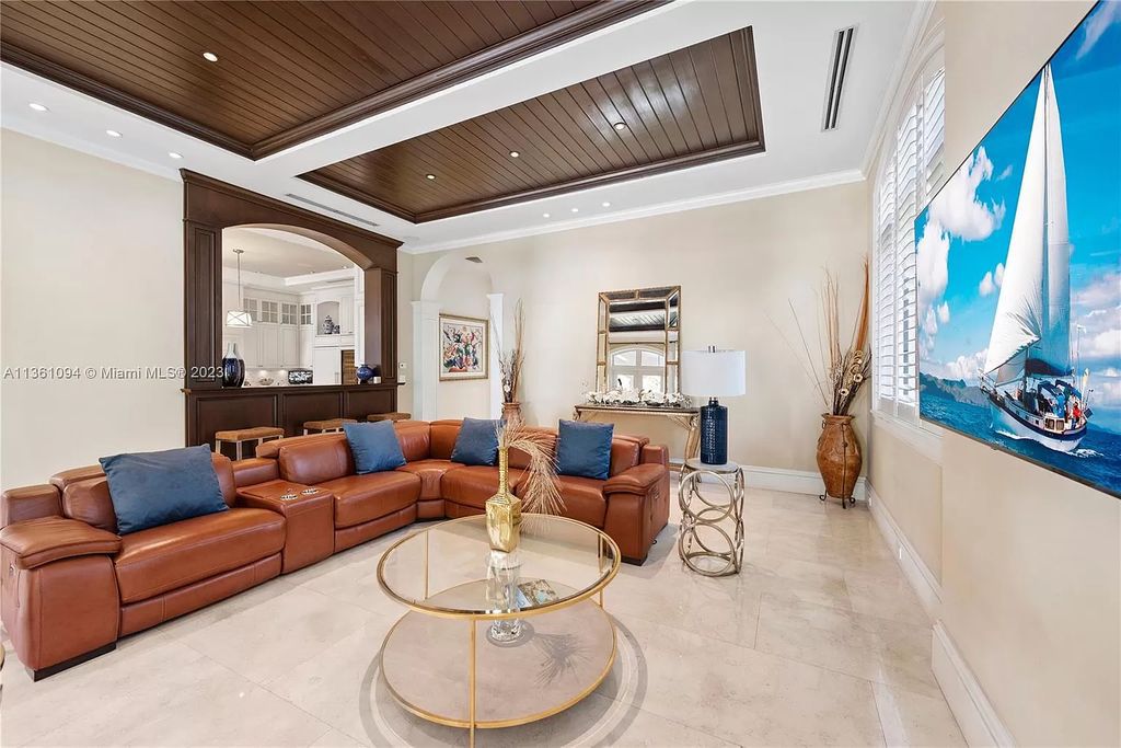 This stunning palatial Neoclassical estate in Coral Gables is the perfect entertainer's dream, with an enormous entertainment wing, movie theater, private guest suite, and resort-style amenities. The 4000sf master wing features a gym, dual closets, luxurious bathroom, large sitting room/office, and expansive terraces. Also includes separate staff/in-law quarters, oversized garages for 6 cars, and access to a 40ft boat slip in Snapper Creek Marina.