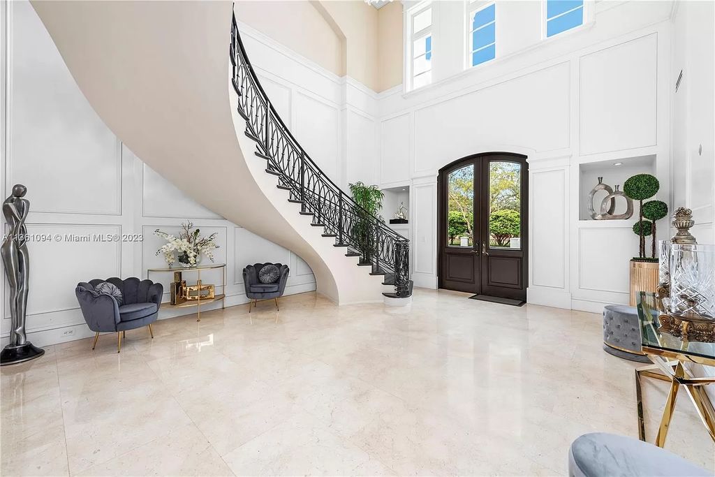 This stunning palatial Neoclassical estate in Coral Gables is the perfect entertainer's dream, with an enormous entertainment wing, movie theater, private guest suite, and resort-style amenities. The 4000sf master wing features a gym, dual closets, luxurious bathroom, large sitting room/office, and expansive terraces. Also includes separate staff/in-law quarters, oversized garages for 6 cars, and access to a 40ft boat slip in Snapper Creek Marina.