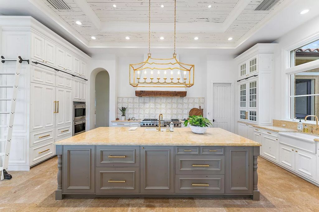 Boasting the finest views in Old Palm, this 6-bedroom, 8.5-bathroom estate offers complete privacy and an entertainer's dream kitchen. With all new French Oak floors, light fixtures, bathrooms, and more, this home is truly the best of the best!