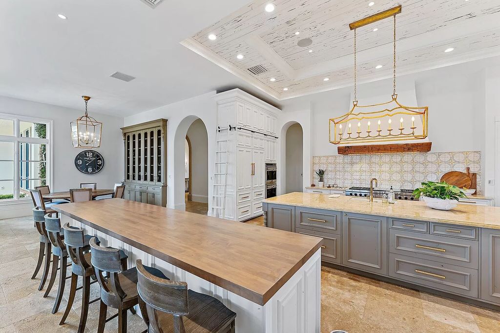 Boasting the finest views in Old Palm, this 6-bedroom, 8.5-bathroom estate offers complete privacy and an entertainer's dream kitchen. With all new French Oak floors, light fixtures, bathrooms, and more, this home is truly the best of the best!